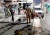 Security forces alert after grenade attack at Palladium cinema lane in Lal Chowk, Srinagar on Sunday. —Excelsior/Shakeel