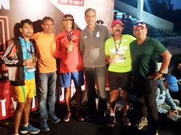 Members of Jammu Runners Group after winning medals in Tuffman Stadium Run at Panchkula in Chandigarh.