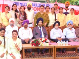 Students posing alongwith College Management at SMS College of Education in Jammu.