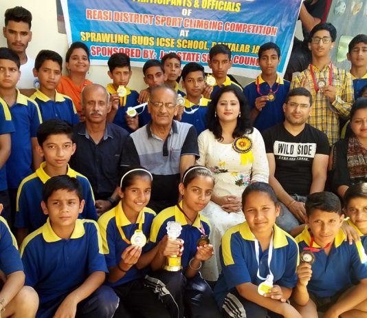 Winners of Reasi District Sport Climbing Championship posing alongwith chief guest at Sprawling Buds ICSE School, Jammu on Monday.