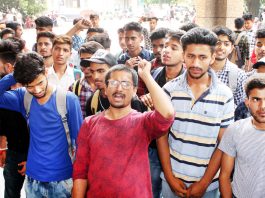 Students protesting against hike in revaluation and re-examination fees at JU in Jammu. -Excesior/ Rakesh