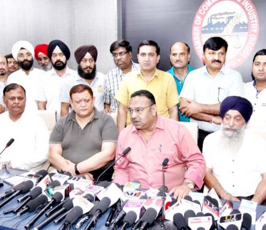 JCCI president Rakesh Gupta flanked by others addressing press conference in Jammu on Tuesday. -Excelsior/Rakesh