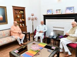 Prime Minister Narendra Modi and BJP National President Amit Shah blessed by L K Advani after Party's historical victory in General Election 2019, in New Delhi on Friday. (UNI)