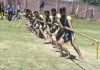 Players in action during an inter-district Tug of War competition in Pulwama.