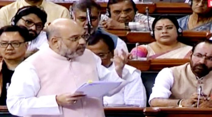 Union Home Minister Amit Shah speaking in the Lok Sabha on Friday.