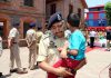 SSP Srinagar Dr Haseeb Mughal breaks down as he carries son of martyr Inspector Arshad Ahmed Khan during wreath laying ceremony in DPL Srinagar on Monday.