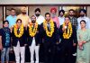 Gold medal winner in International event State Tug of War players posing with office bearers of the Association at Jammu on Wednesday.