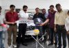 Officials of Red Chief handing over the key of Renault Kwid to its lucky customer Lovneesh Gautam at Ghaziabad.