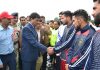 Financial Commissioner Dr A K Mehta interacting with players while inaugurating Football Tournament in Srinagar on Tuesday.