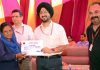 CEO Shrine Board Simrandeep Singh giving certificate to one of the employees at Katra on Tuesday.