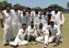 Players of Virat Cricket Club posing for a photograph after registering win in JKCA Jammu District Cricket Tournament on Tuesday.