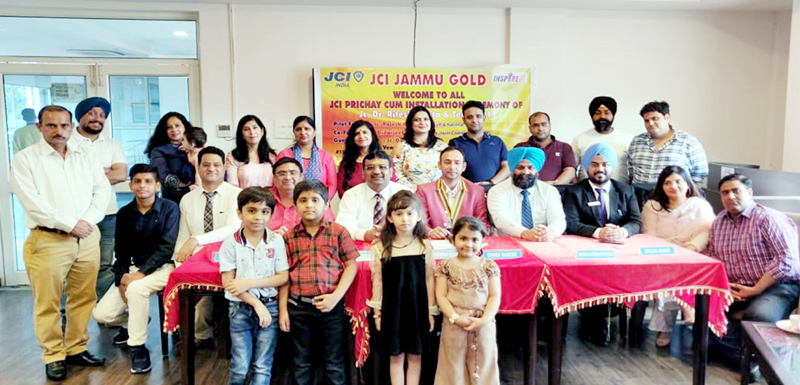 New JCI Jammu Gold president, Dr Ritesh Gupta posing with others at Golf Club Course, Sidhra in Jammu.