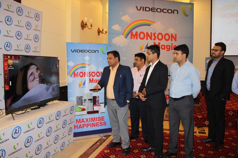 Officials of Videocon on the launch of 'Monsoon Magic' offer on its AI Smart LED TV range in Jammu. -Excelsior/Rakesh