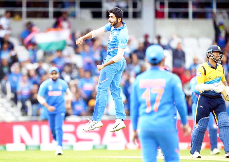 Jasprit Bumrah in action after taking the wicket of Sri Lankan batsman during league match in ICC Cricket World Cup 2019 at Leeds on Saturday. (UNI)