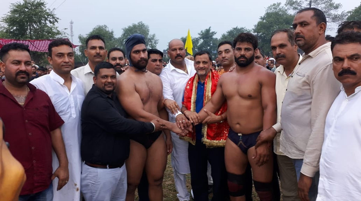 Winners of Battal Ballian Dangal title being honoured by the dignitaries on Tuesday.
