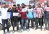 SDRF aspirants staging protest at Press Enclave in Srinagar. —Excelsior/Shakeel