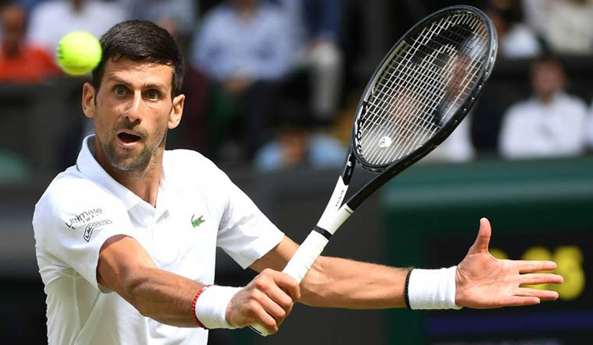 Djokovic playing a backhand shot on his way to sixth Wimbledon final.