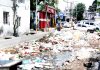 Garbage scattered on the road in front of Parade dumping yard in Jammu City. -Excelsior/Rakesh