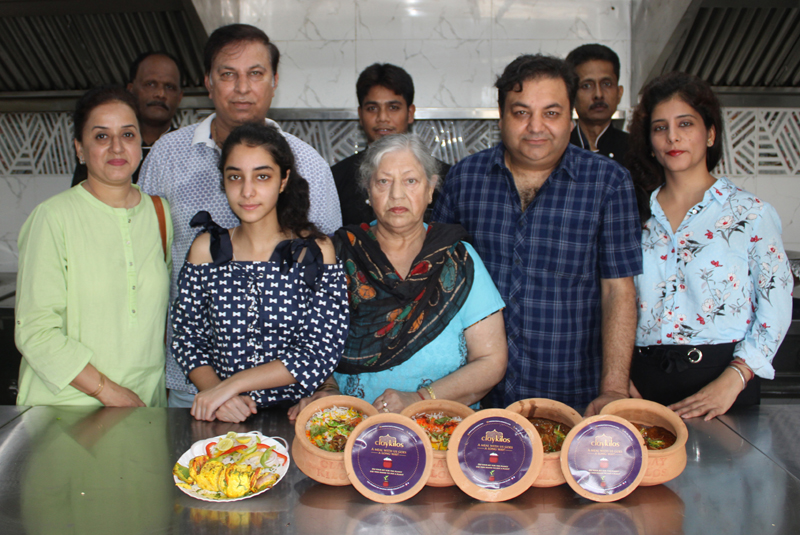Ashwani Anand and Gagan Anand launching their online kitchen ‘Claykilos’ along with their family. —Excelsior/Rakesh