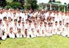 Young campers posing with chief guest and organising committee at Sports Stadium, Poonch on Saturday.