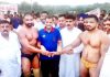 Wrestlers contesting for the title bout being introduced by the guests at Chak More in Udhampur.