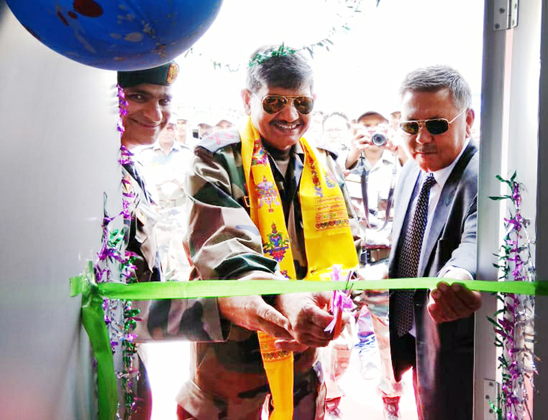 Army officer inaugurating ATM of J&K Bank.