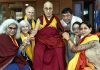 Kingian non-violence peace educators posing with Dalai Lama.