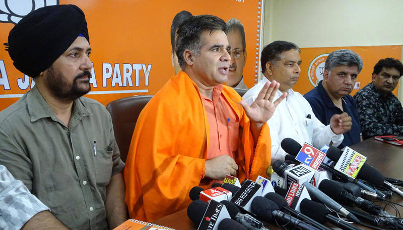 BJP state president Ravinder Raina and other party leaders at a press conference at Jammu on Saturday. —Excelsior/Rakesh