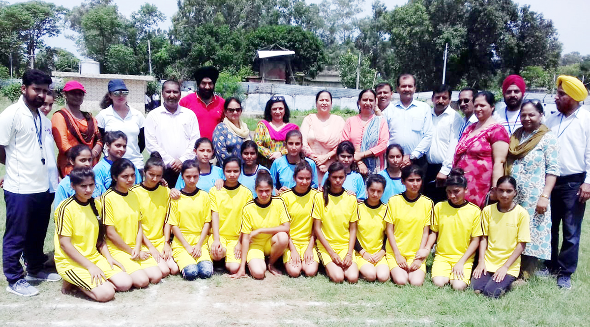 Players posing for a group photograph along with DYSSO Jammu, Chanchal Kour during opening ceremony of Inter Zonal competitions in Jammu.