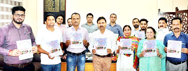 Director Social Welfare Jammu and other officials releasing department's Citizen's Charter at Jammu on Sunday.