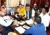 Advisor K Skandan interacting with a deputation in Srinagar on Monday.