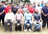 J&K players and office bearers of All J&K State Power Lifting Association posing for group photograph.