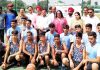 Players posing along with DDC Udhampur, Dr Piyush Singla during Inter-District tournament on Tuesday.