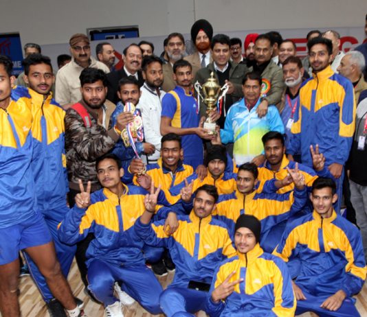 Jubilant UP U-17 Volleyball team players posing along with Sarmad Hafeez, Dr Saleem-ur-Rehman, other dignitaries and officials in Jammu on Friday. -Excelsior/Rakesh