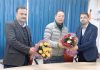 Staff members of office of Director Finance (P) J&K Circle Jammu presenting bouquet to retiring PD Tshering, CPMG J&K Circle Jammu.