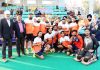Winners of Hockey Championship posing along with dignitaries and officials in Jammu.