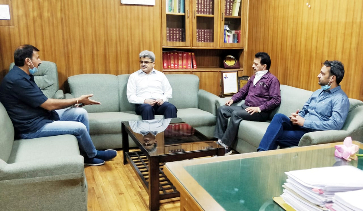 BJP delegation briefing Financial Commissioner Health Atal Dulloo on the condition of quarantine centres in Jammu on Friday.