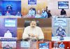 Union Minister Dr Jitendra Singh reviewing the current COVID status in Jammu & Kashmir and Ladakh with the administration, through video-conference, on Tuesday.