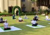 Lt Governor of J&K UT and staff of Raj Bhawan Jammu practicising Yoga on Sunday.