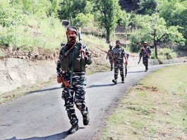Troops during encounter at Kulgam on Friday. -Excelsior/ Sajjad Dar