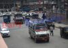 Public transport operates on a road in Srinagar on Saturday. —Excelsior/Shakeel