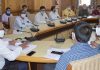 Divisional Commissioner Kashmir chairing a meeting on Tuesday.