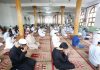 Muslims offering Eid prayers at Jamia Masjid at Bandipora on Saturday. -Excelsior/Aabid Nabi
