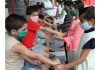 Girls in Bal Ashram Jammu tying Rakhi to boys on the occasion of Rakshabandhan on Monday. —Excelsior/Rakesh