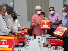 Lt Governor launching home delivery of Pooja Prasad during 67th meeting of SMVD Shrine Board on Monday.