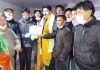 A candidate gets victory certificate in Leh on Monday.