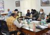 Lt Governor chairing a meeting at Srinagar on Thursday.