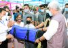 Lt Governor Manoj Sinha handing over sport kits to students at Udhampur during B2V programme.