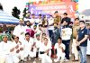 Winning team along with dignitaries posing for a group photograph with trophy at Poonch.