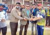 Dignitaries presenting man of the match award to winner at MA Stadium Jammu on Thursday.